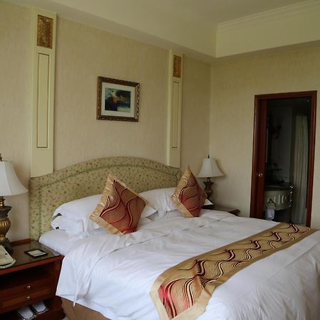 Huiquan Dynasty Hotel Qingdao Zimmer foto