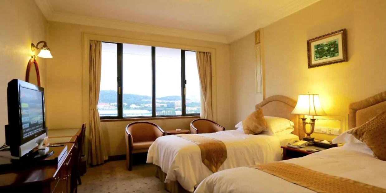 Huiquan Dynasty Hotel Qingdao Exterior foto